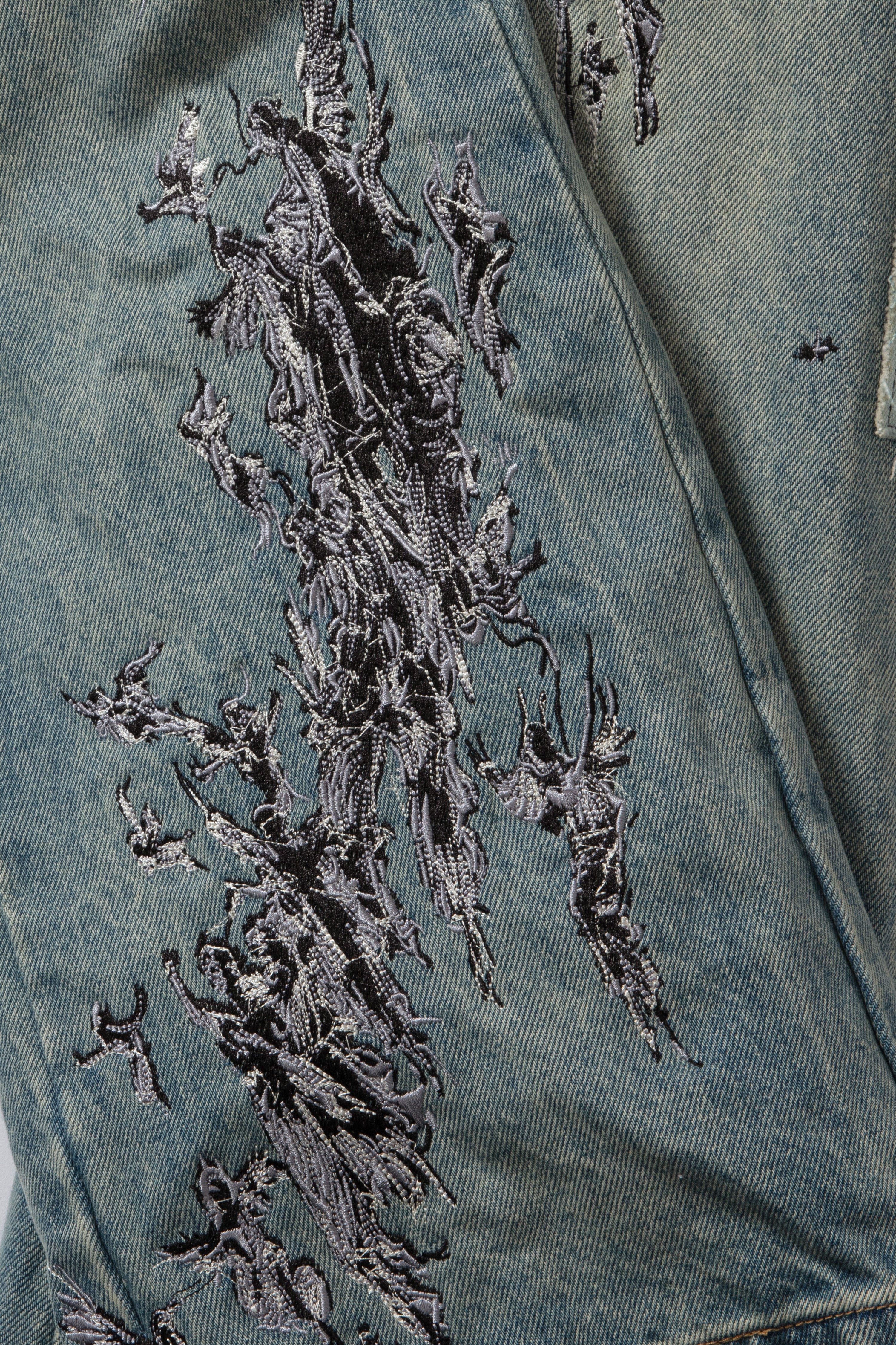 SCRATCHED DENIM