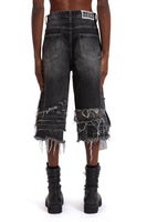 PATCHED ARCH BLOWOUT DENIM SHORT